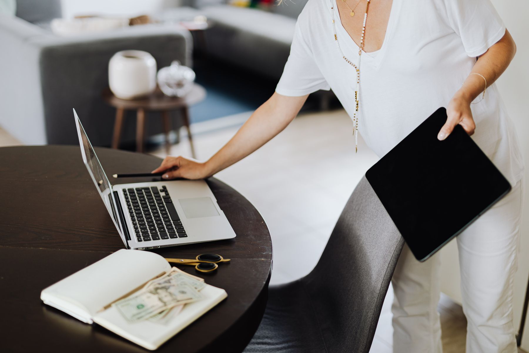 Website operator using AI-assisted planning on a laptop