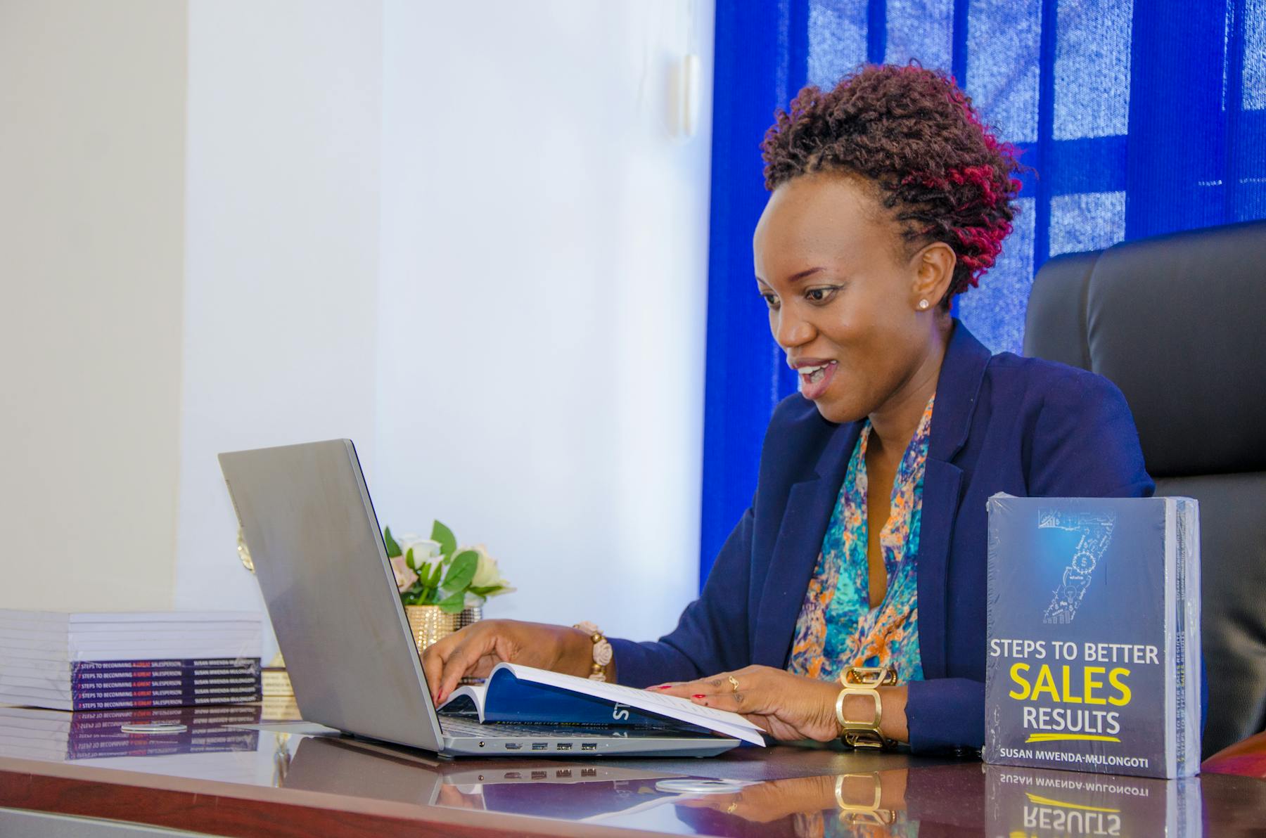 Business operator preparing email follow-up from a website workspace